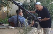 speaking to man on steps