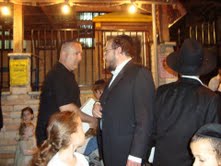 Zev speaking with orthodox man