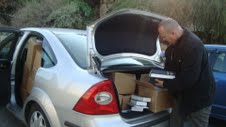 Zev getting out of car